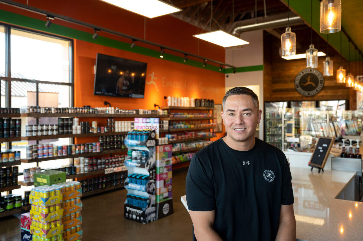 Chris Brown, owner of Emerald City Smoothie, poses for a portrait at Puyallup store on Friday, Nov. 18, 2022.