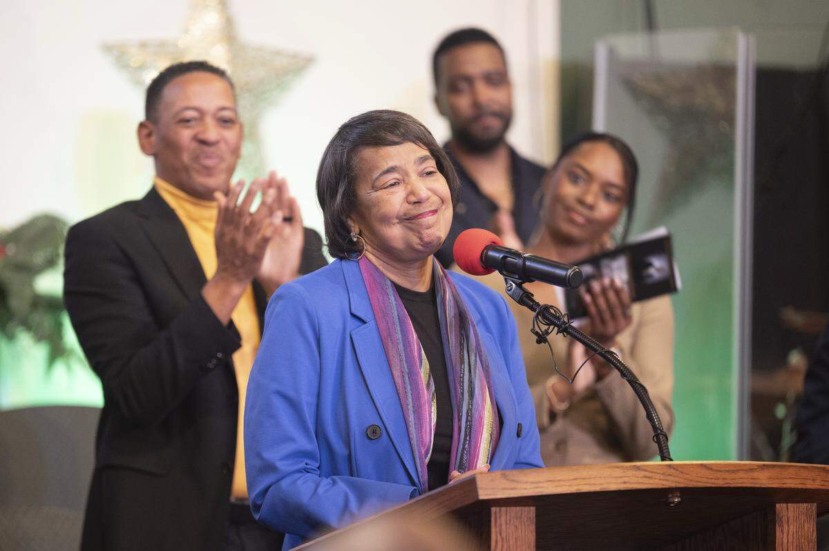 Those gathered for an honorary street renaming ceremony for Curtis E. Montgomery Street clap during Mayor Victoria Woodards’ remarks, where she shared that dedicating the street sign will be her last act as mayor, on Saturday, Dec. 27, 2025, at Greater Christ Temple Church in Tacoma, Wash.
