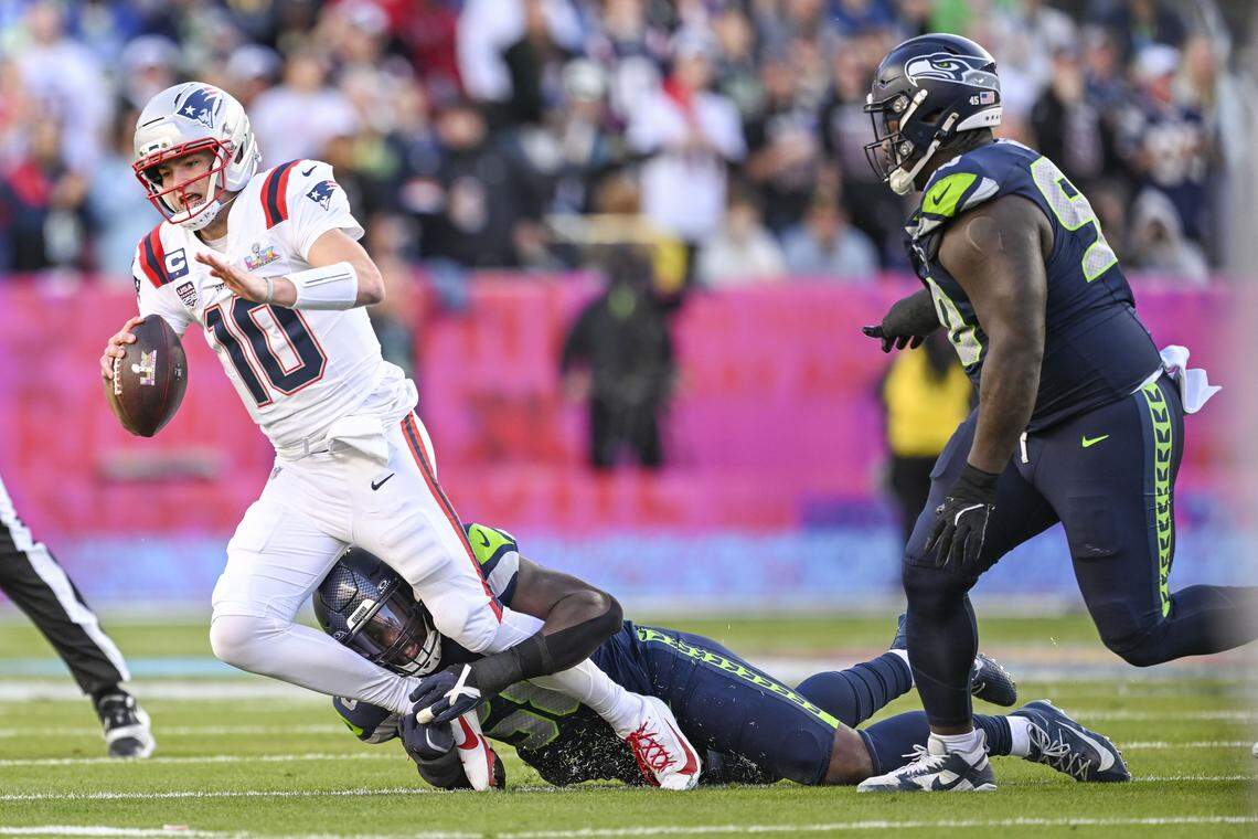 Seattle Seahawks linebacker Derick Hall (58) sacks New England Patriots quarterback Drake Maye (10) during the first quarter of Super Bowl LX at Levi's Stadium on Feb. 8, 2026 in Santa Clara, Calif.