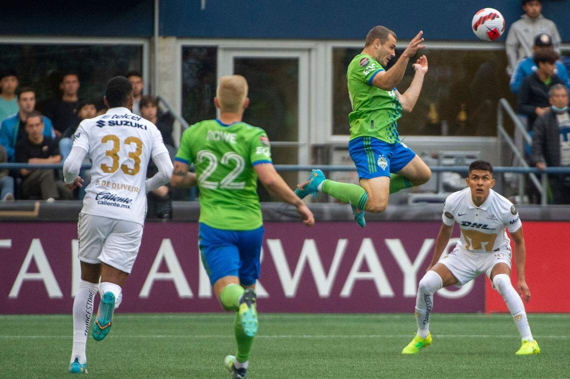 Seattle Sounders forward Jordan Morris (13) heads the ball to a teammate as Pumas defender Ricardo Galindo (47) watches during the first half of the second leg of the CONCACAF Champions League Final at Lumen Field in Seattle, on Wednesday, May 4, 2022.