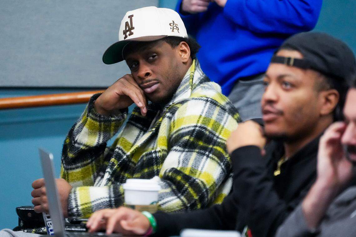 Seattle Seahawks quarterback Geno Smith looks over at reporters as he attends a media availability after it was announced Pete Carroll will not return as head coach next season, Wednesday, Jan. 10, 2024, at the NFL football team’s headquarters in Renton, Wash. Carroll will remain with the organization as an advisor. (AP Photo/Lindsey Wasson)