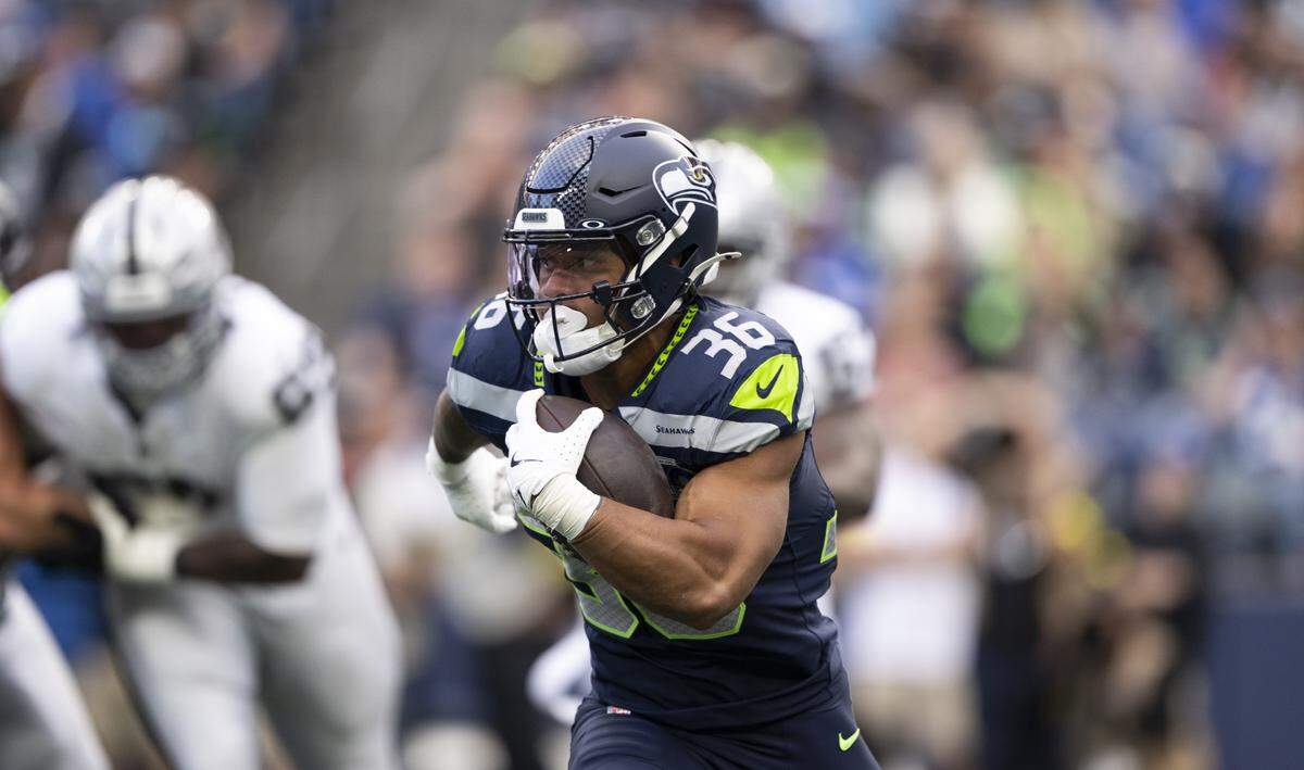 Seattle Seahawks running back George Holani (36) carries the ball during the first quarter of the game at Lumen Field, on Thursday, Aug. 7, 2025, in Seattle, Wash.