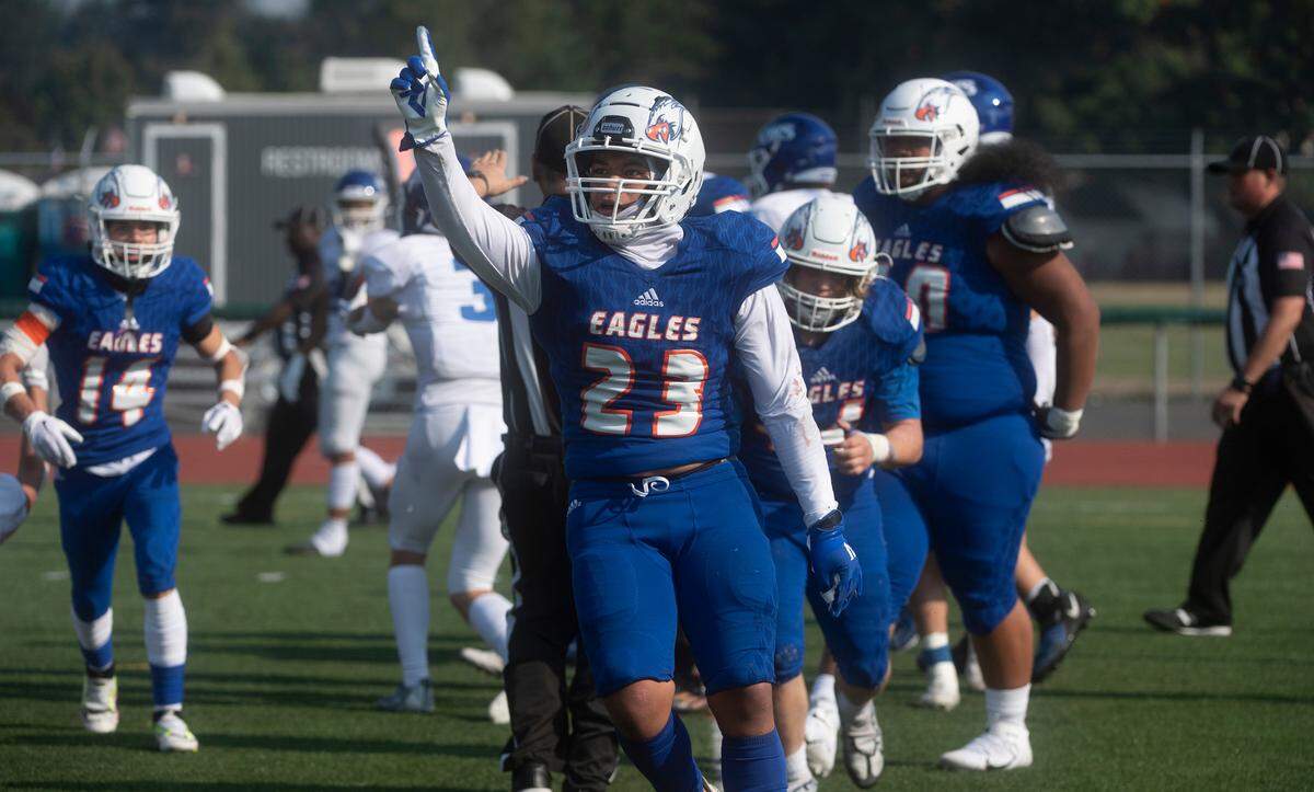 Graham-Kapowsin linebacker Leuma Teylor-Pomele celebrates a two-point conversion stop of the Curtis Vikings during Saturday’s football game at Art Crate Field in Spanaway, Washington, Oct. 8, 2022. Graham-Kapowsin won the game, 24-19.