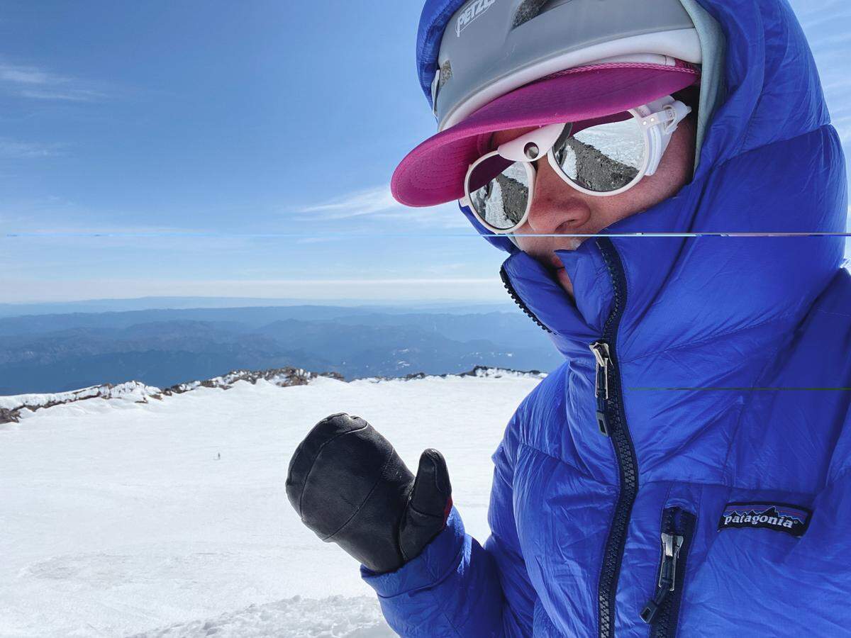 Kimber Cross on the summit of Mount Rainier.
