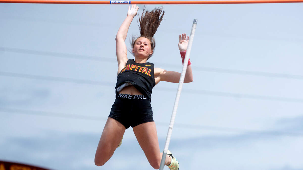 Capital junior Amanda Moll clears the bar at 14’ 6” to win the 3A girls pole vault competition during the second day of the WIAA State Track and Field Championships at Mount Tahoma High School in Tacoma, Washington on Friday, May 27, 2022.