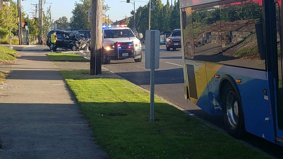 An SUV driver suspected by police to be impaired by drugs or alcohol collided with the rear tire of a Pierce Transit bus Tuesday morning, causing traffic backups on Pacific Avenue at South 38th Street.