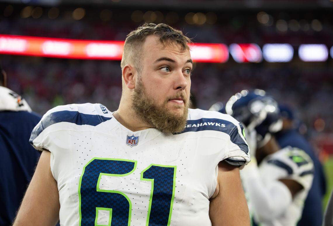Dec 8, 2024; Glendale, Arizona, USA; Seattle Seahawks offensive tackle Jalen Sundell (61) against the Arizona Cardinals at State Farm Stadium. Mandatory Credit: Mark J. Rebilas-Imagn Images