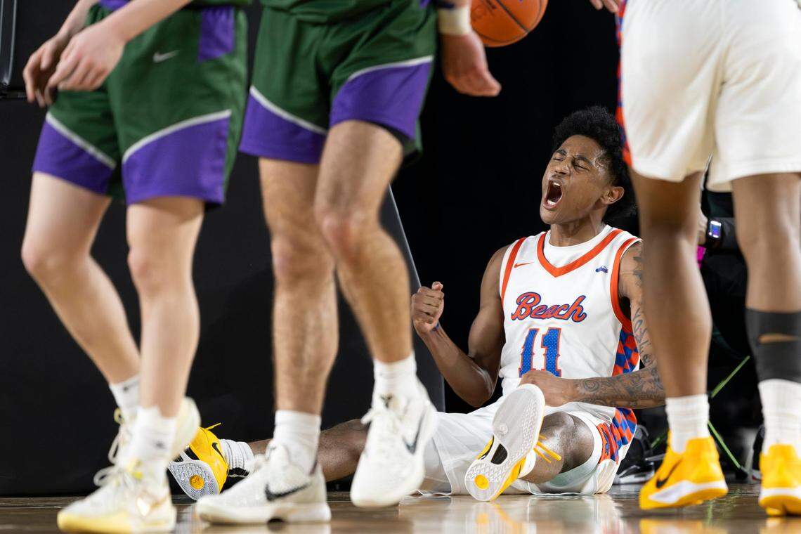Rainier Beach guard Jaylen Petty (11) celebrates after making a basket while being fouled by an Edmonds-Woodway player during the third quarter of the Class 3A state championship game at the Tacoma Dome on Saturday, March 8, 2025, in Tacoma, Wash.
