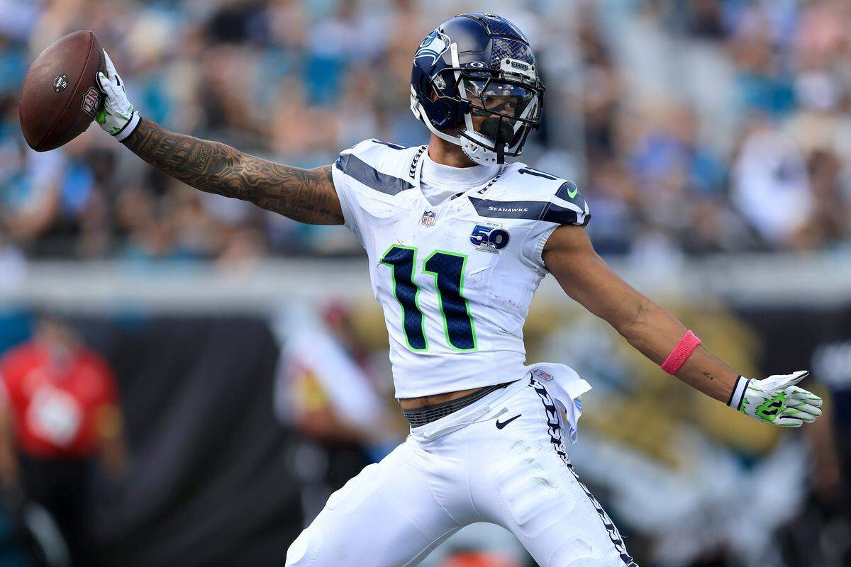JACKSONVILLE, FLORIDA - OCTOBER 12: Jaxon Smith-Njigba #11 of the Seattle Seahawks celebrates after a touchdown reception during the second quarter against the Jacksonville Jaguars in the game at EverBank Stadium on October 12, 2025 in Jacksonville, Florida. (Photo by Mike Carlson/Getty Images)
