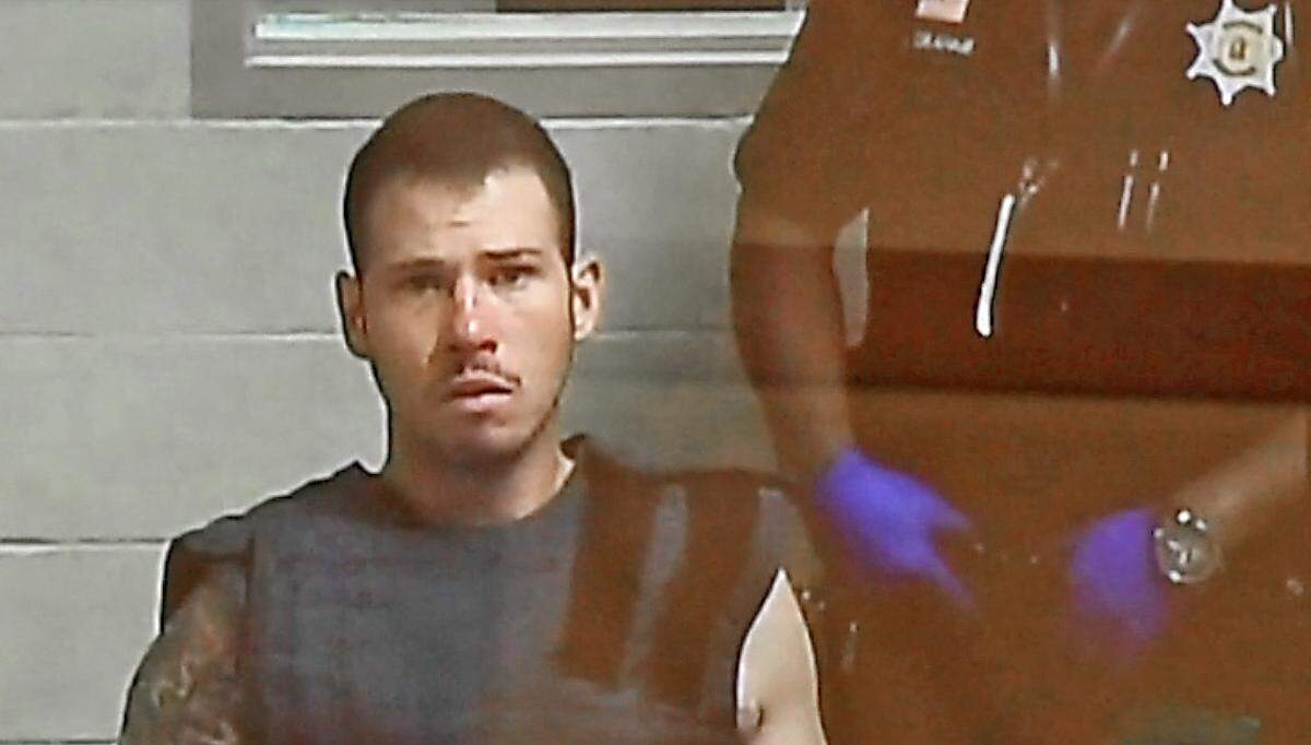 Patrick Byrne, 26, appears via video for arraignment in Pierce County Superior Court Friday, July 23, 2021. Prosecutors charged Byrne, who is stationed at Joint Base Lewis-McChord, with two counts of first-degree murder, first-degree burglary and two counts of first-degree kidnapping in the death of security guard Denise Smith, 41, of Seattle.