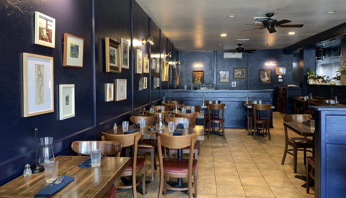 Corbeau, a French-leaning restaurant in Tacoma’s Proctor District, opened in August 2024. The service-charge model works for their tight-knit crew, according to server Autum Achord.