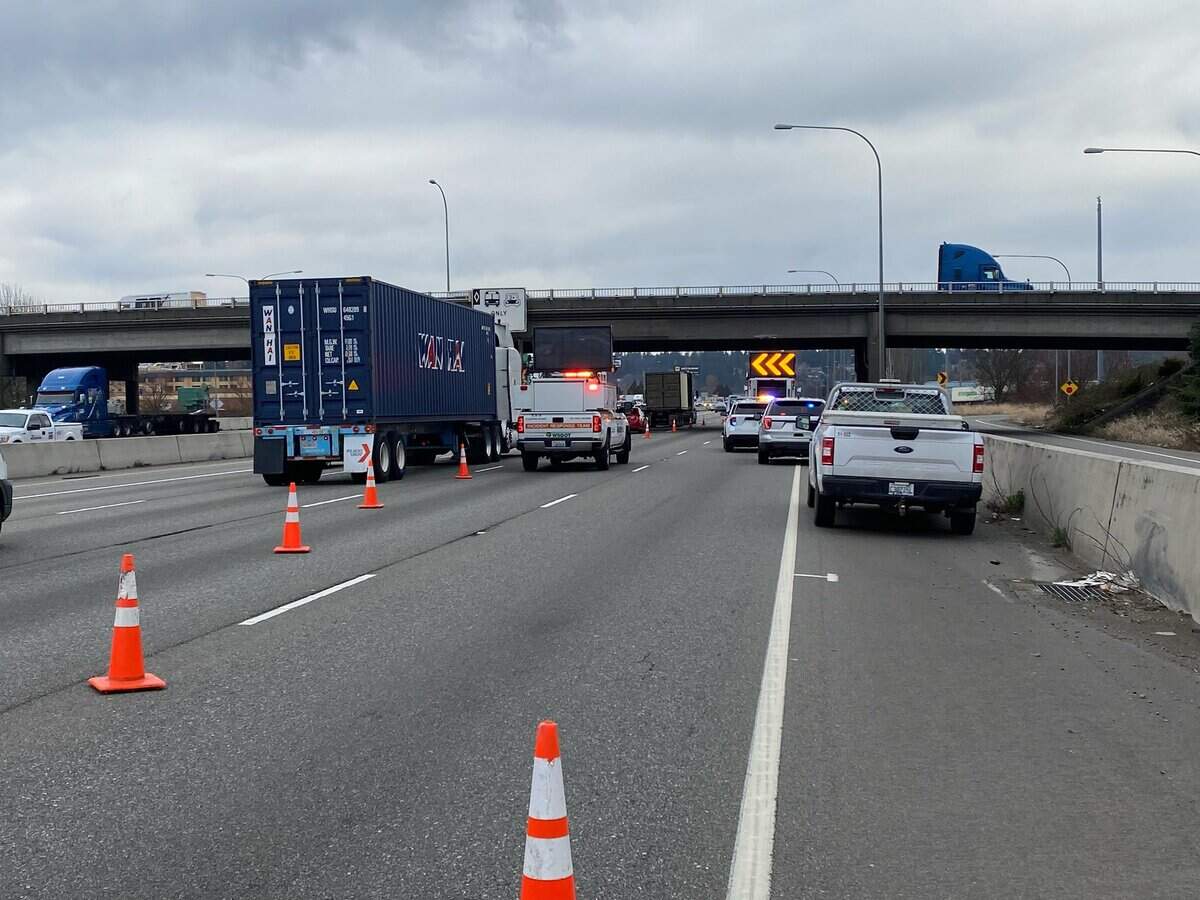Northbound Interstate 5 in Fife was reduced to three lanes at 54th Street East after a semi truck with too tall a load struck and damaged the overpass, according to the Washington State Department of Transportation.