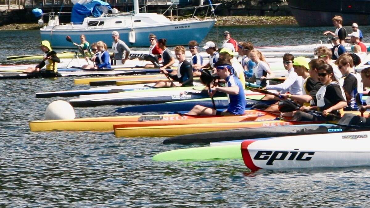 Lining up for the starting gun of the first race of the Paddlers Cup Saturday are competitors in canoes and kayaks from throughout the South Sound.