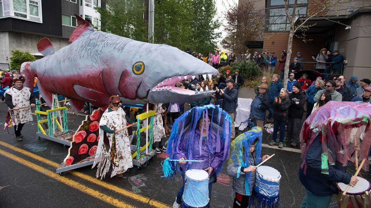 Crowds line the streets of downtown Olympia for the return of the Procession of the Species celebration in 2024.