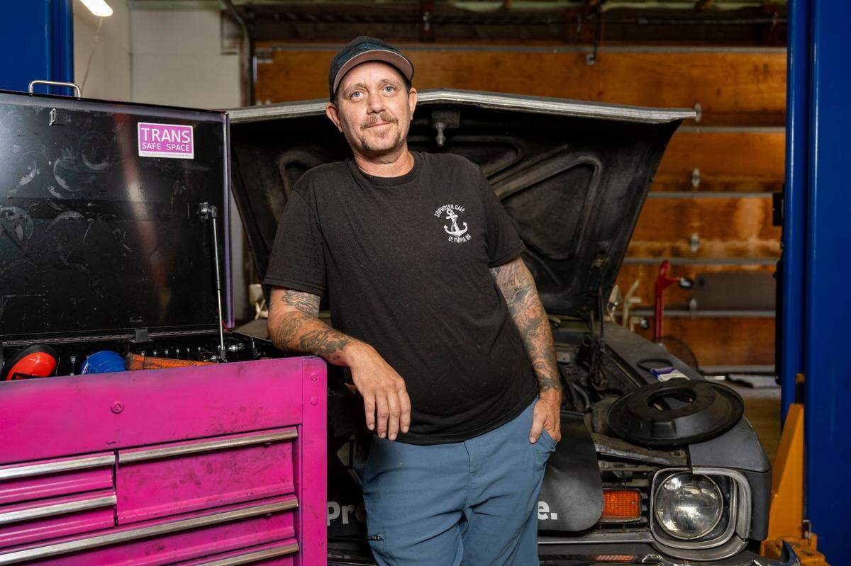 MJ Montgomery poses for a portrait inside the garage at his home in Ruston on Monday, July 3, 2023.