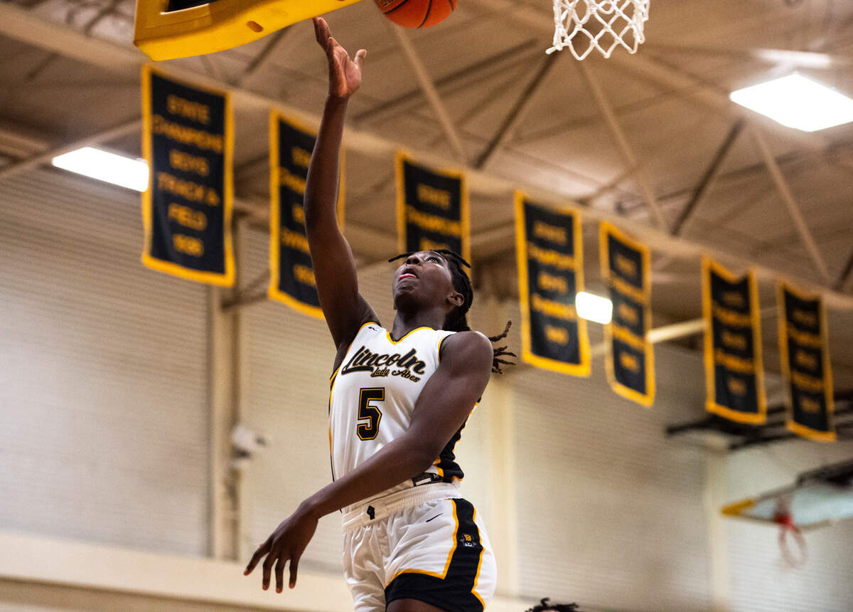 Lincoln forward Oliviyah Edwards (5) goes in for a layup during a first round Class 3A West Central/Southwest district tournament game against Todd Beamer at Lincoln High School in Tacoma, Wash. on Feb. 10, 2023. Lincoln defeated Todd Beamer 55-28.