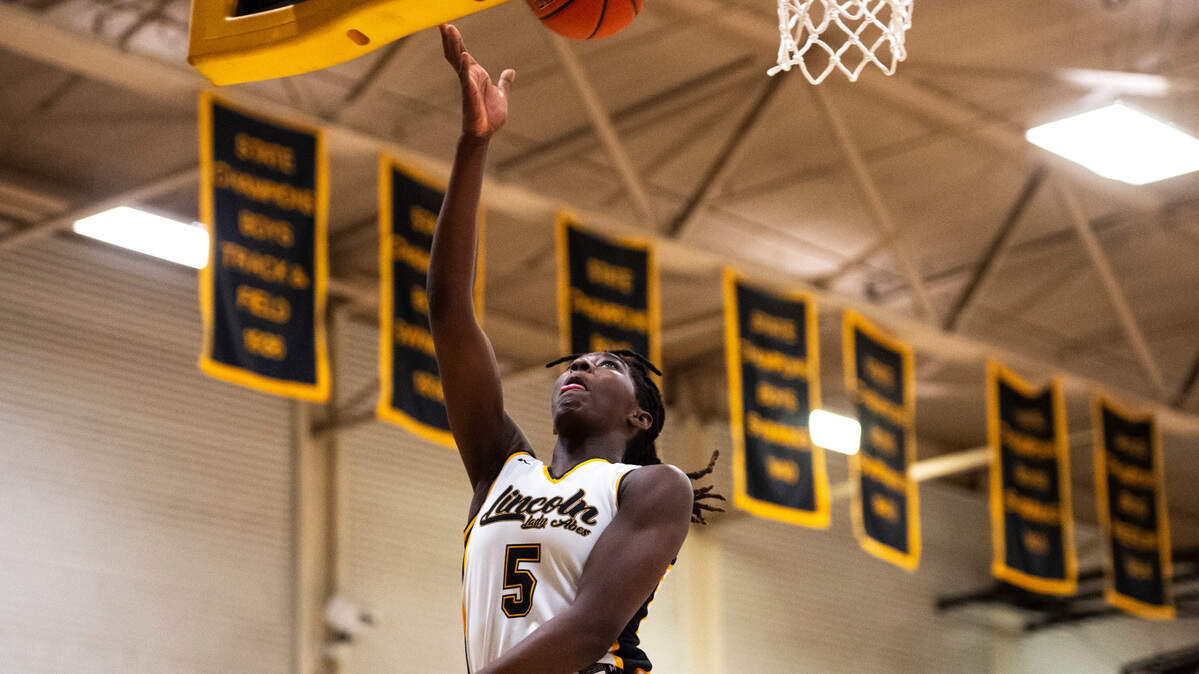 Lincoln forward Oliviyah Edwards (5) goes in for a layup during a first round Class 3A West Central/Southwest district tournament game against Todd Beamer at Lincoln High School in Tacoma, Wash. on Feb. 10, 2023. Lincoln defeated Todd Beamer 55-28.