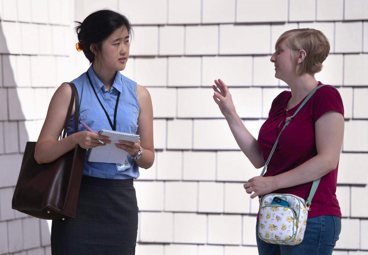 News Tribune intern Julia Park interviews PenMet Parks spokesperson Heather Dyson on Aug. 2, 2024. The News Tribune hired Park as the newsroom’s Gig Harbor reporter following her internship.