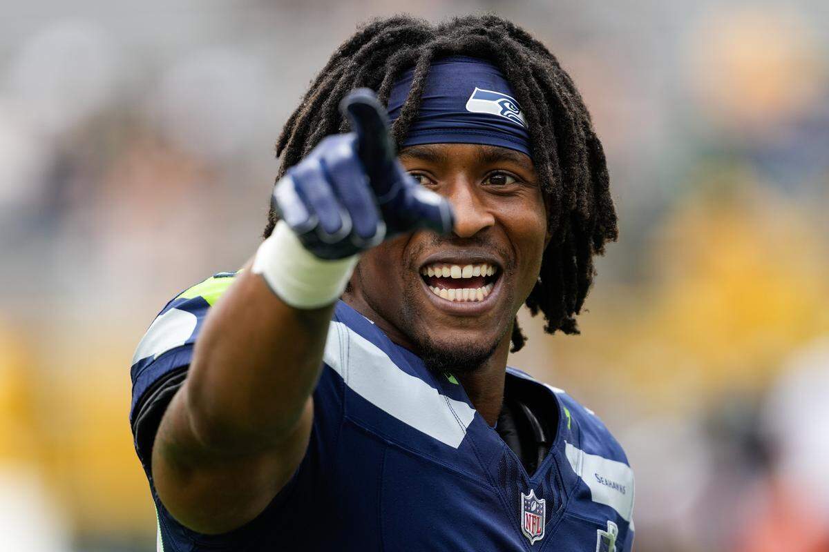 Seattle Seahawks cornerback Damarion Williams (37) gestures towards fans prior to the game against the Green Bay Packers at Lambeau Field. Mandatory Credit: Jeff Hanisch-Imagn Images