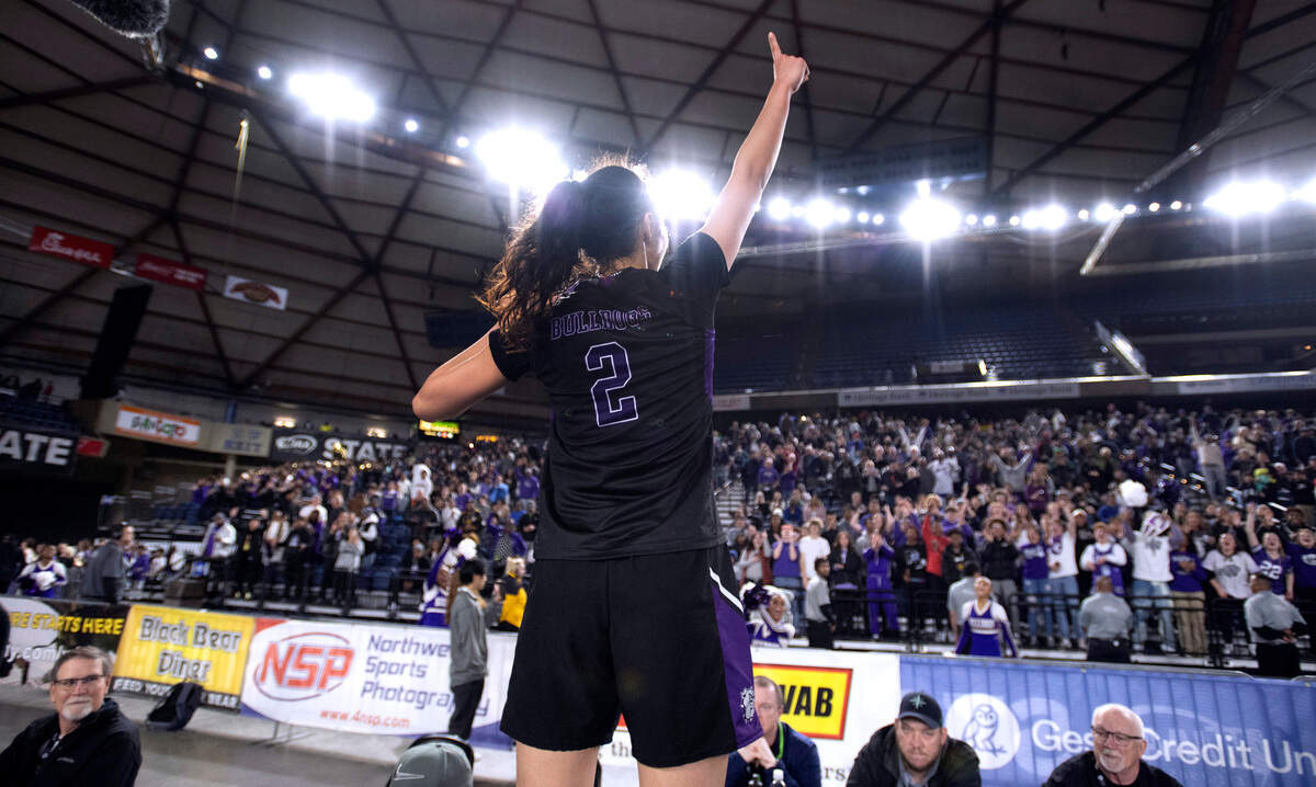 Garfield’s Katie Fiso celebrates following the Bulldogs’ 3A girls state title win over the Lake Washington Kangaroos at the WIAA state basketball tournament in the Tacoma Dome in Tacoma, Washington, on Saturday, March 4, 2023. Garfield won the game, 58-49.