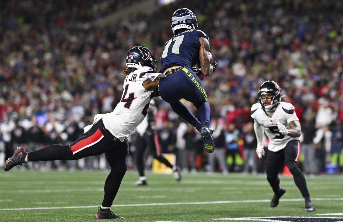 Seattle Seahawks wide receiver Jaxon Smith-Njigba (11) makes an 11-yard touchdown against the Houston Texans during the first quarter of the game at Lumen Field, on Monday, Oct. 20, 2025, in Seattle.