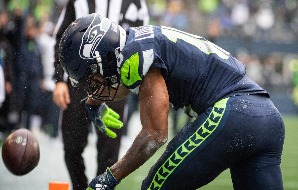 Seattle Seahawks wide receiver Tyler Lockett (16) celebrates a touchdown catch during the first quarter. The Seattle Seahawks played the Baltimore Ravens in a NFL football game at CenturyLink Field in Seattle, Wash., on Sunday, Oct. 20, 2019.