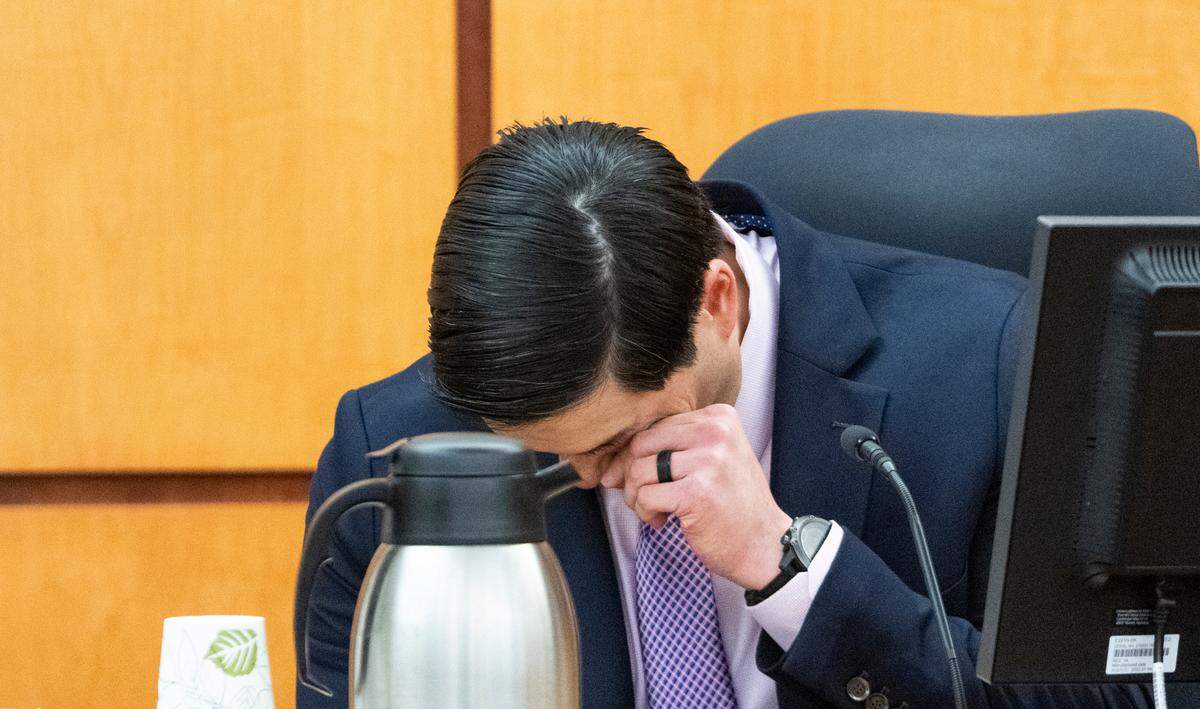 Defendant Timothy Rankine wipes his eyes while testifying during the trial of three Tacoma Police officers in the killing of Manny Ellis at Pierce County Superior Court, Tuesday, Dec. 5, 2023, in Tacoma, Wash. Tacoma Police Officers Christopher Burbank, Matthew Collins and Timothy Rankine stand trial for charges related to the March 2020 killing of Manny Ellis. (Brian Hayes / Pool Photo – The News Tribune)
