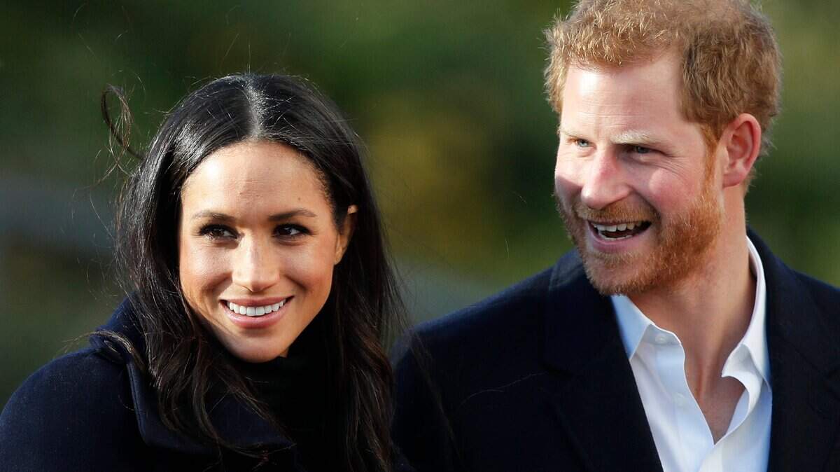 FILE - In this Dec. 1, 2017 file photo, Britain’s Prince Harry and his fiancee Meghan Markle arrive at Nottingham Academy in Nottingham, England. Buckingham Palace said Monday May 6, 2019, that Prince Harry’s wife Meghan has gone into labor with their first child. (AP Photo/Frank Augstein, File)