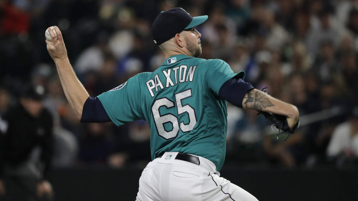 Seattle Mariners starting pitcher James Paxton throws to a New York Yankees batter during the first inning of a baseball game Friday, Sept. 7, 2018, in Seattle. (AP Photo/Ted S. Warren)
