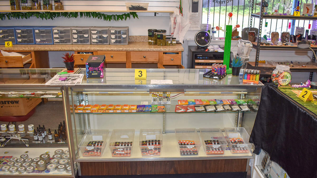 WA state Liquor and Cannabis Board officers found illegal cannabis products, cash and guns inside Medicine Creek Territory pot shop in Nisqually area.