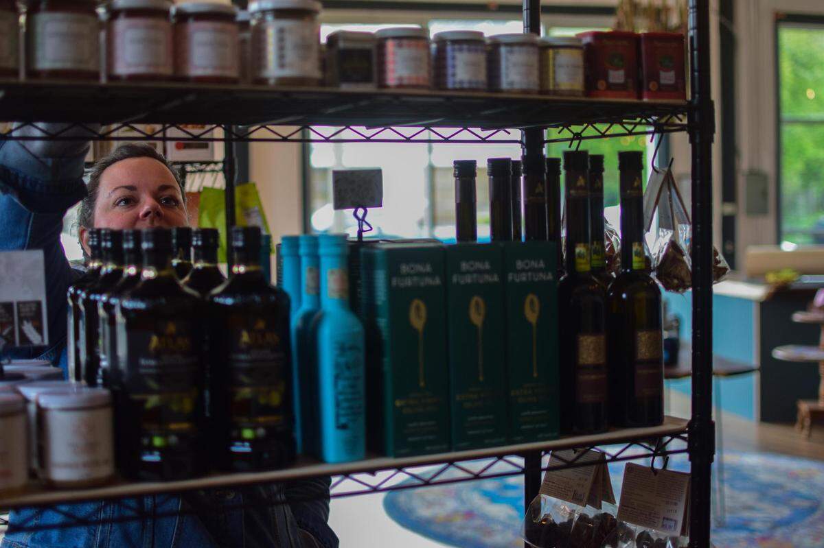 Leanne Franetovich tidies the shelves at The Mill by Jack + Adeline, a specialty market near downtown Tacoma. It’s the first step of what will soon include a woodworking studio and showroom, and later a winer bar and in-house bakery.