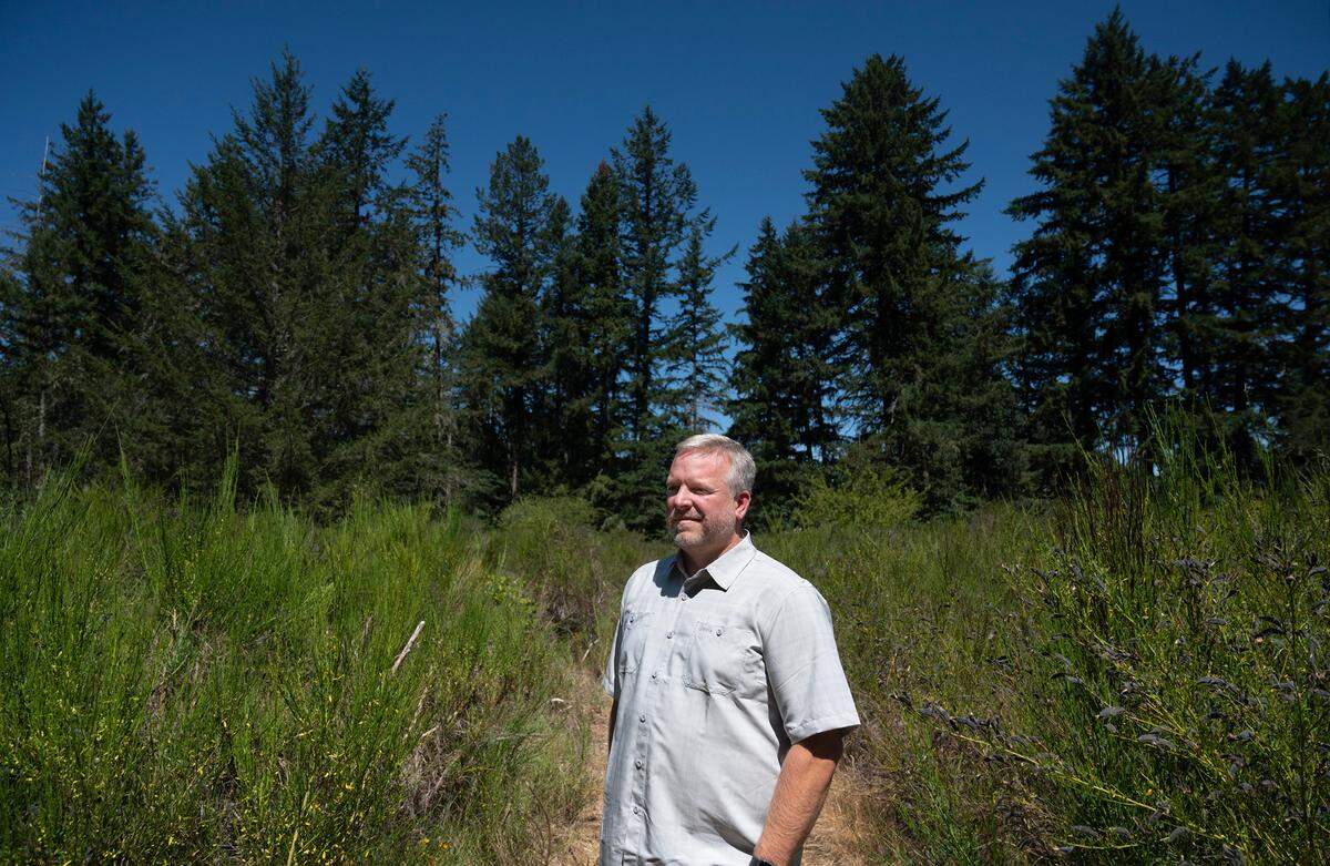 Duke Paulson of the Tacoma Rescue Mission at the site of the proposed 285-unit tiny home village in Spanaway, Washington, on Tuesday, Aug. 1, 2023