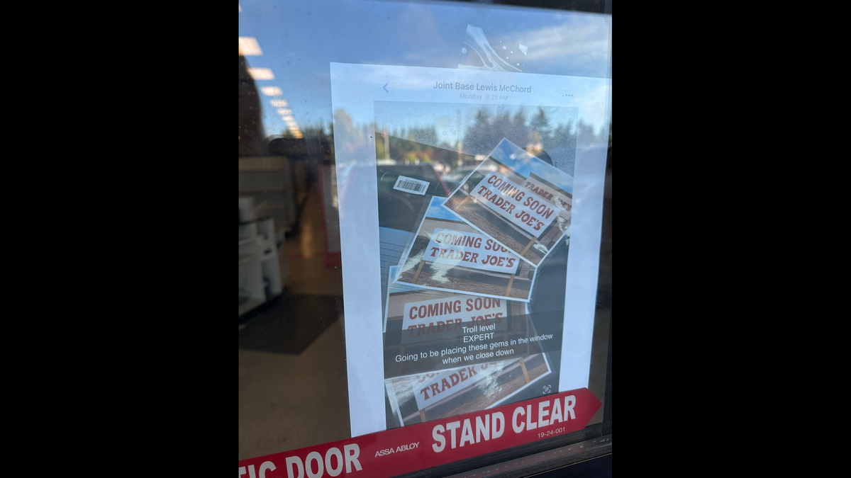 A joke “Coming soon, Trader Joe’s” sign was seen at the former Gig Harbor Bartell Drugs at Olympic Village.