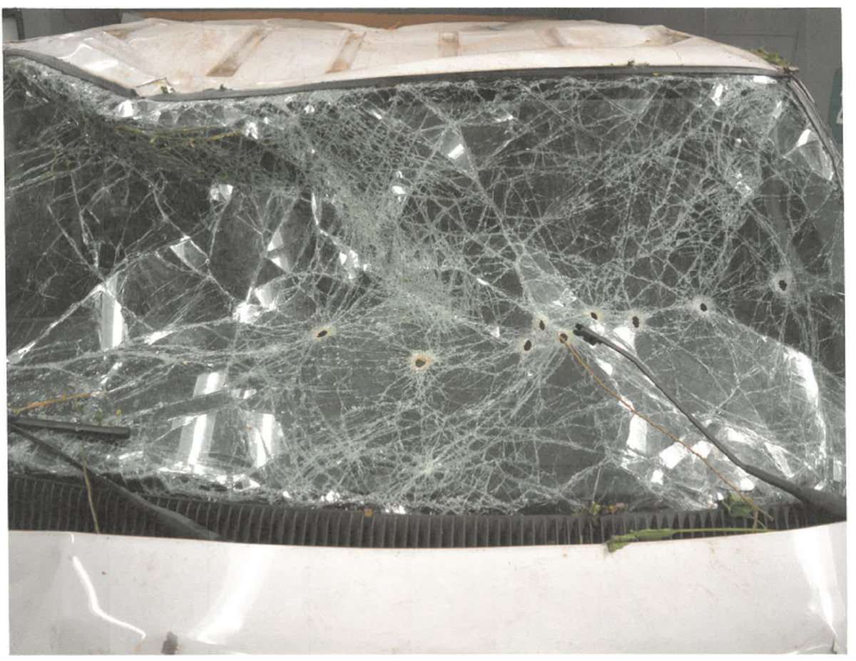 The windshield of a vehicle Juan Jose Carbajal shot out of while fleeing from law enforcement amid a mental health crisis in Pierce County on July 4, 2022, is shown in a photograph filed with the court.