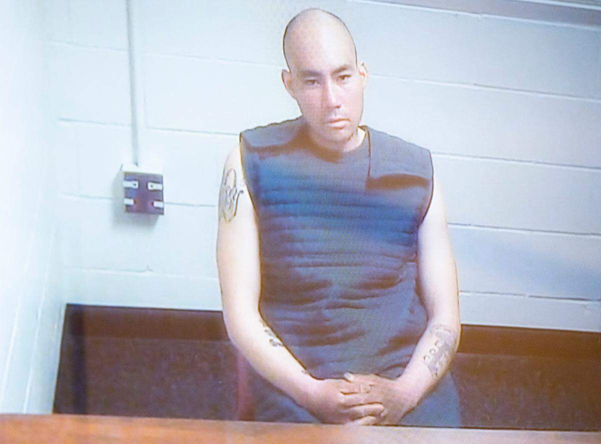 Brandon Lee Archuleta, 36, appears in court virtually for his arraignment after being charged with first-degree murder and first-degree unlawful possession of a firearm regarding the fatal shooting of a 26-year-old man on Tuesday at a homeless encampment in Tacoma, at the Pierce County Superior Courthouse in Tacoma, Wash. on March 1, 2023.