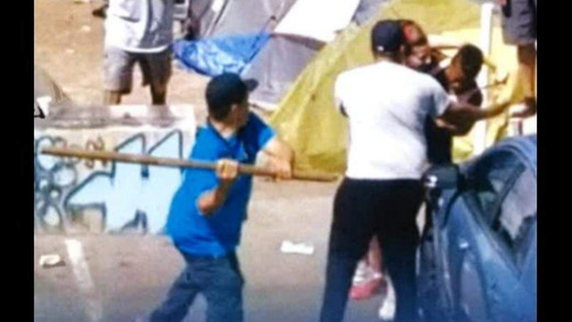 A man died after a couple hit him with their car as they attempted to flee from attackers in a Seattle homeless encampment July 27, 2021, officials said. The couple entered the camp to retrieve stolen items, King County Superior Court documents say.