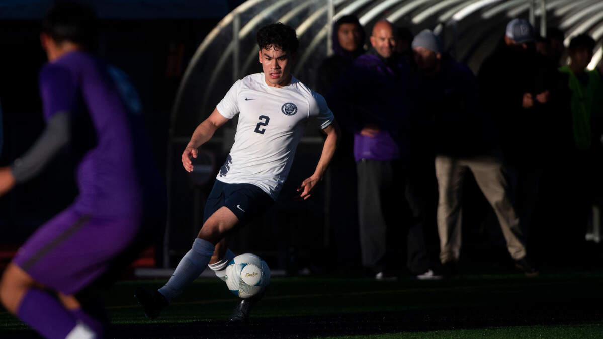 Bellarmine Prep’s Jack Radovich dribbles up field during the second half of a 4A semifinal game against Pasco at Sparks Stadium on Friday, May 27, 2022, in Puyallup, Wash.