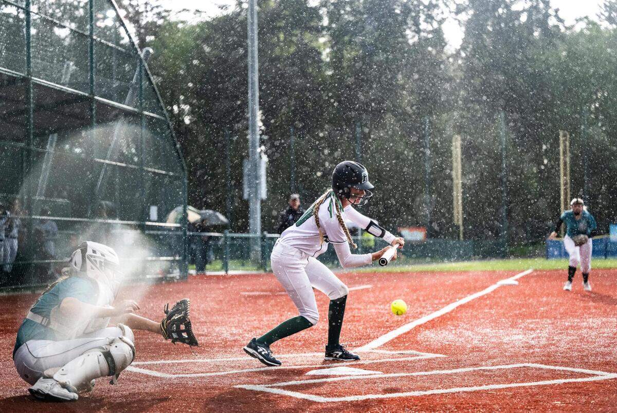 Peninsula’s Grace Estabrook, 10, tries to hit the ball during the 3A state softball tournament quarterfinals at the Regional Athletic Complex on Friday, May 27, 2022 in Olympia, Wash. Bonney Lake defeated Peninsula 3-2 with a triple play in the seventh inning to win the quarterfinal game.