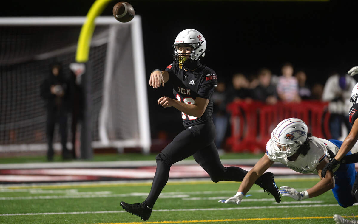 Yelm quarterback Parker Myers delivers a pass during Friday night’s football game against the Graham Kapowsin Eagles at Yelm High School in Yelm, Washington, on Oct. 4, 2024.