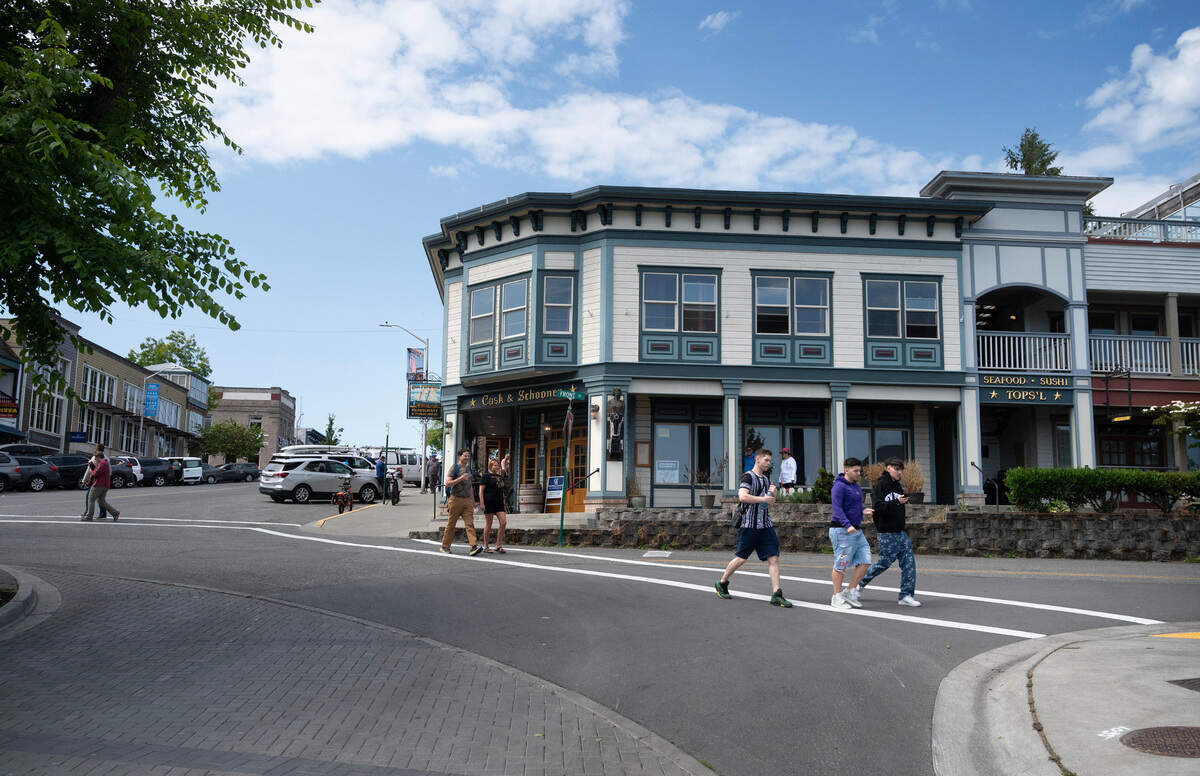 Visitors explore Friday Harbor, Washington, on San Juan Island on Monday, June 26, 2023.