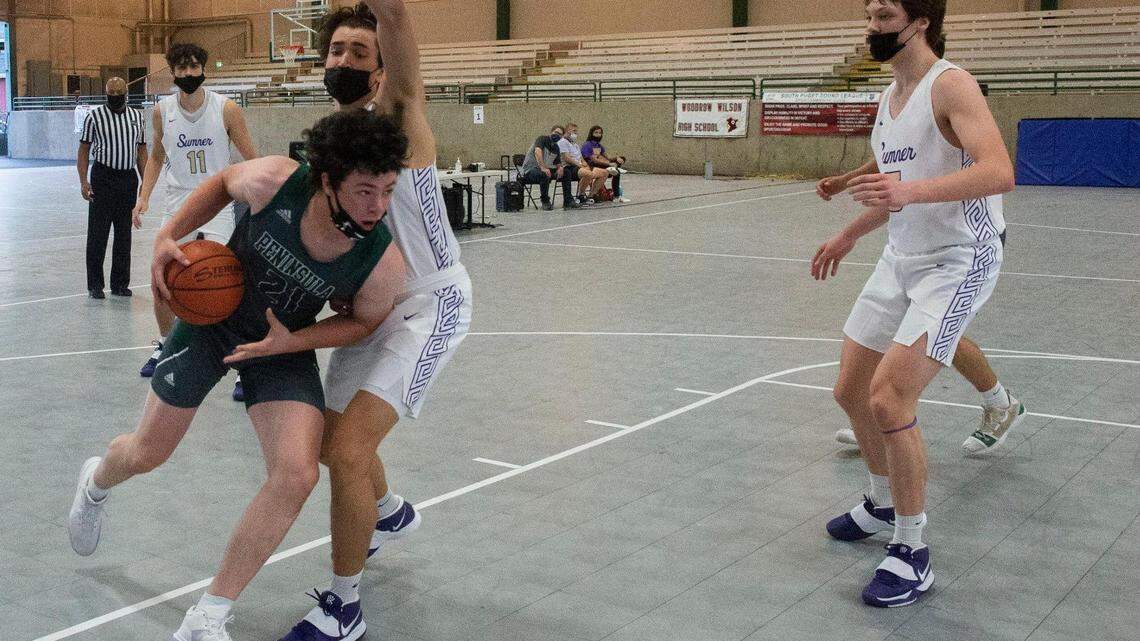 Peninsula High’s Caleb Wanaka drives against the Sumner defense Friday, May 14 at the Washington State Fairgrounds in Puyallup. Wanaka was killed in a traffic accident Monday.