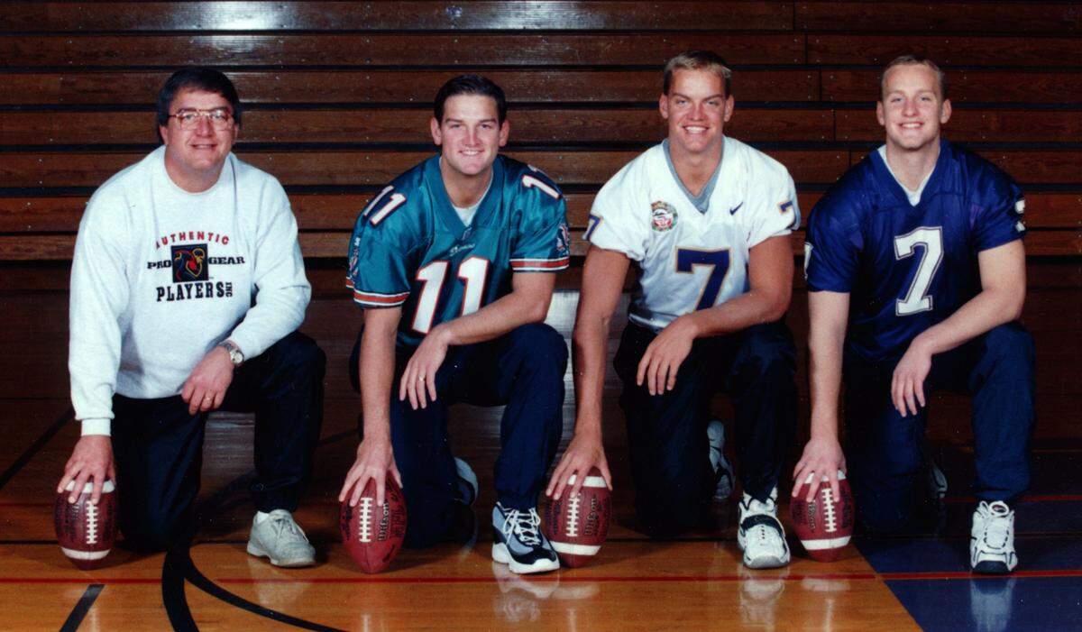 Mike Huard, left, with his sons (from left to right) Damon, Brock, and Luke in 1998.