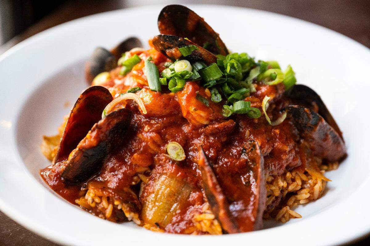 A favorite at Mardi Gras and year-round, the jambalaya at Bourbon Street Creole Kitchen & Bar in Puyallup features andouille sausage, shrimp and mussels in a rich, spicy tomato sauce.