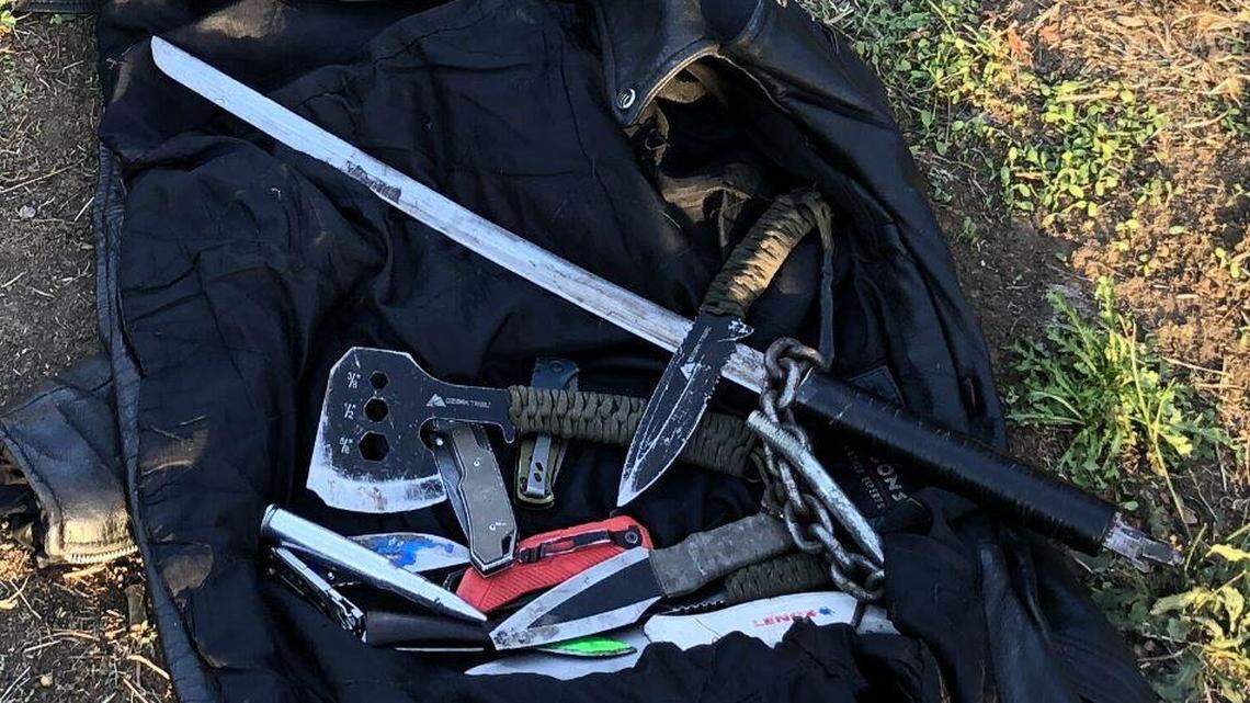 Police arrested a 20-year-old man who is accused of trying to break into a Portland home on Saturday. The man charged at officers with the sword and threw an ax and knives before surrendering. He was found with 15 weapons.
