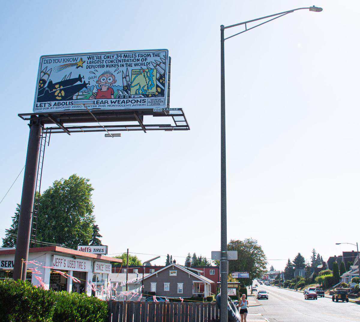 A billboard paid for by Ground Zero Center for Nonviolent Action, a Washington-based organization, sits on the corner of 6th Avenue and Stevens Street on Monday, Aug. 5, 2024 in Tacoma.
