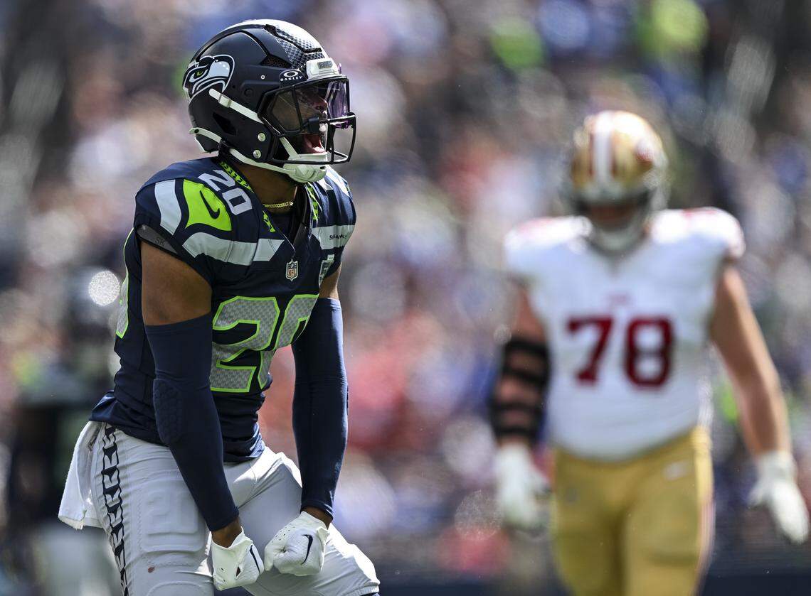 Seattle Seahawks safety Julian Love (20) reacts to a sack on San Francisco 49ers quarterback Brock Purdy (13) during the second quarter of the game at Lumen Field, on Sunday, Sept. 7, 2025, in Seattle.