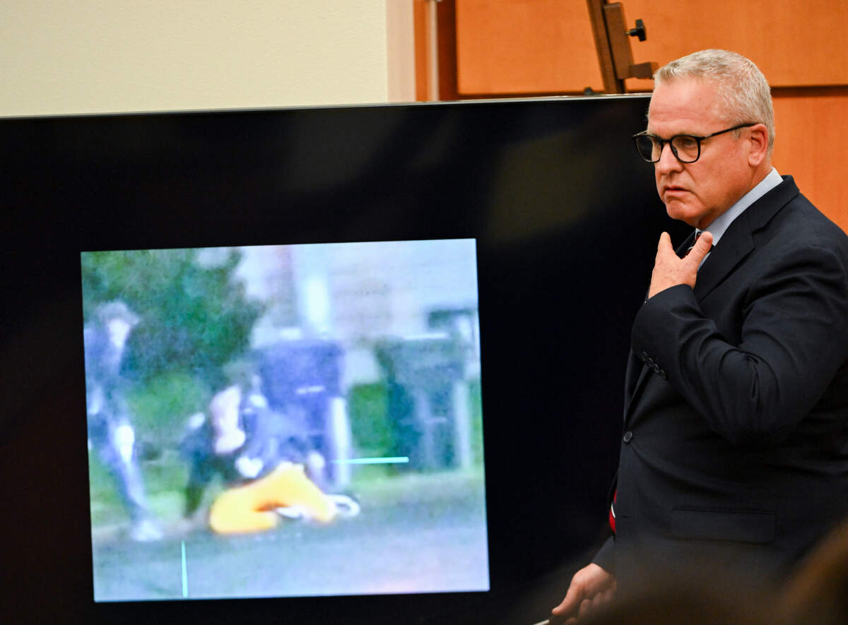 John J. Ryan, a police use-of-force expert, explains the type of choke used during the trial of three Tacoma Police officers in the killing of Manny Ellis at Pierce County Superior Court, Monday, Nov. 6, 2023, in Tacoma, Wash. Tacoma Police Officers Christopher Burbank, Matthew Collins and Timothy Rankine stand trial for charges related to the March 2020 killing of Manny Ellis. (Brian Hayes / Pool Photo – The News Tribune)