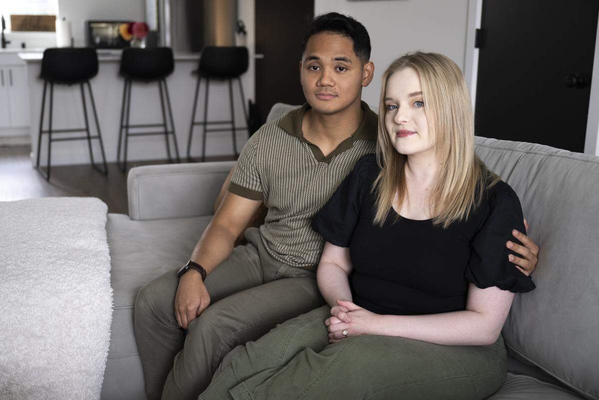 Nathan and Maddie Lea poses for a portrait in her home, on Monday, Aug. 18, 2025, in Puyallup, Wash..