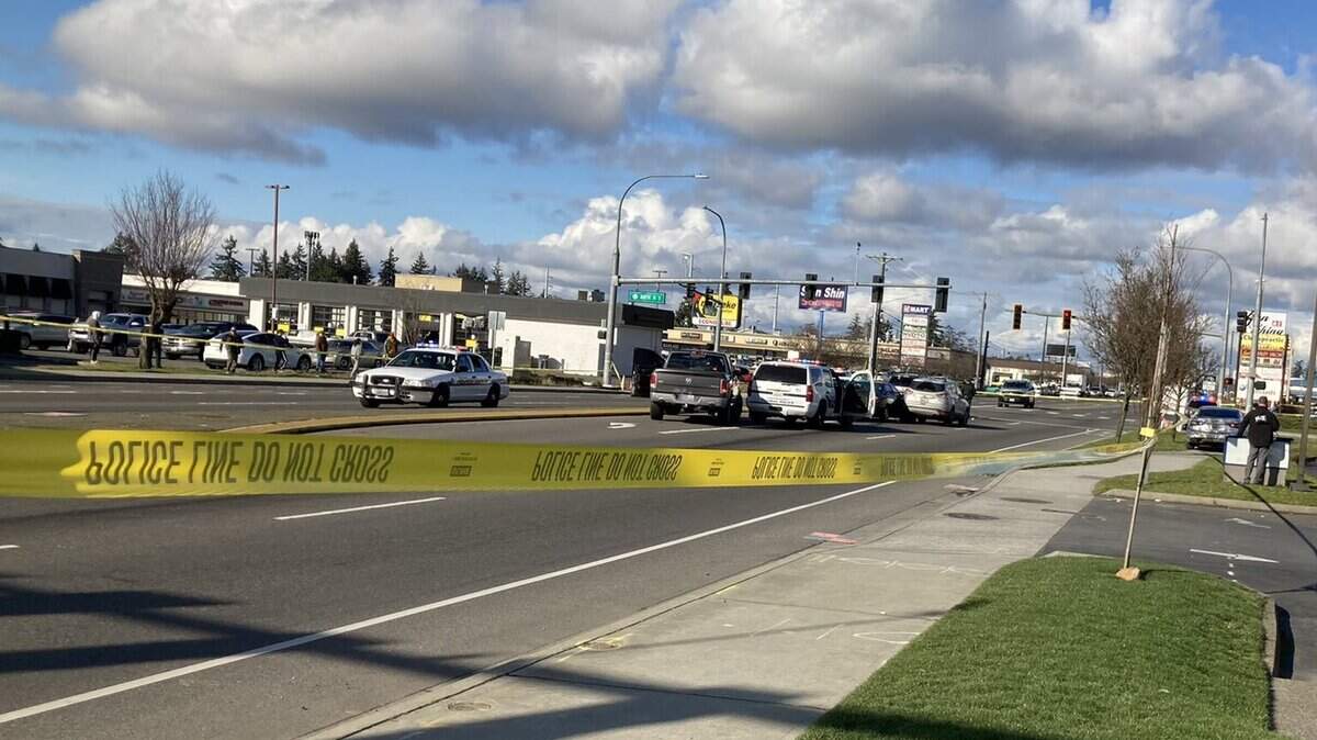 A Tacoma Police Department officer shot a man on South Tacoma Way in Lakewood on Tuesday afternoon while trying to arrest him for investigation of first-degree murder.