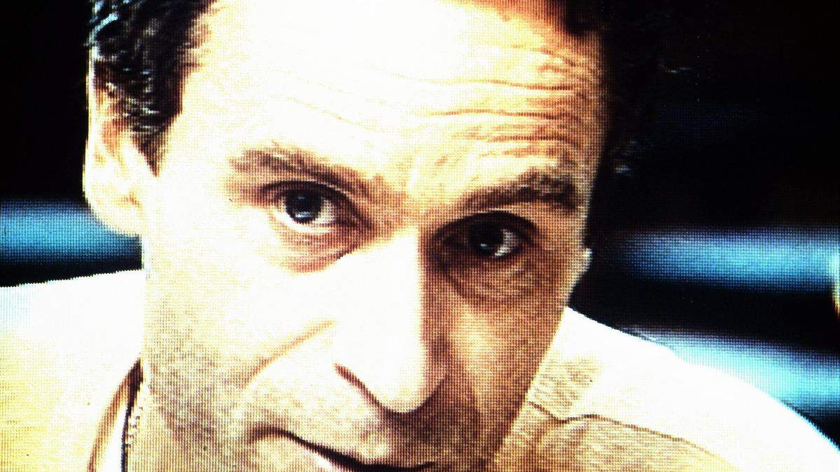 A tearful Ted Bundy discusses views of violence and sex during a taped interview with Dr. James Dobson in Florida, Jan. 23, 1989. Bundy is to be executed tomorrow morning. (AP Photo/Mark Foley)